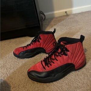 Reverse Flu Game Jordan 12s.       Red and Black High-Top Sneakers